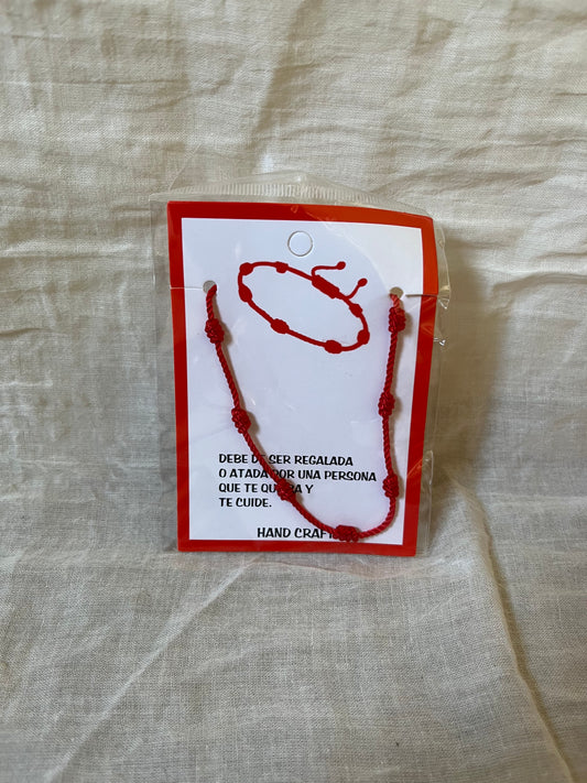 Pulsera roja "7 nudos"